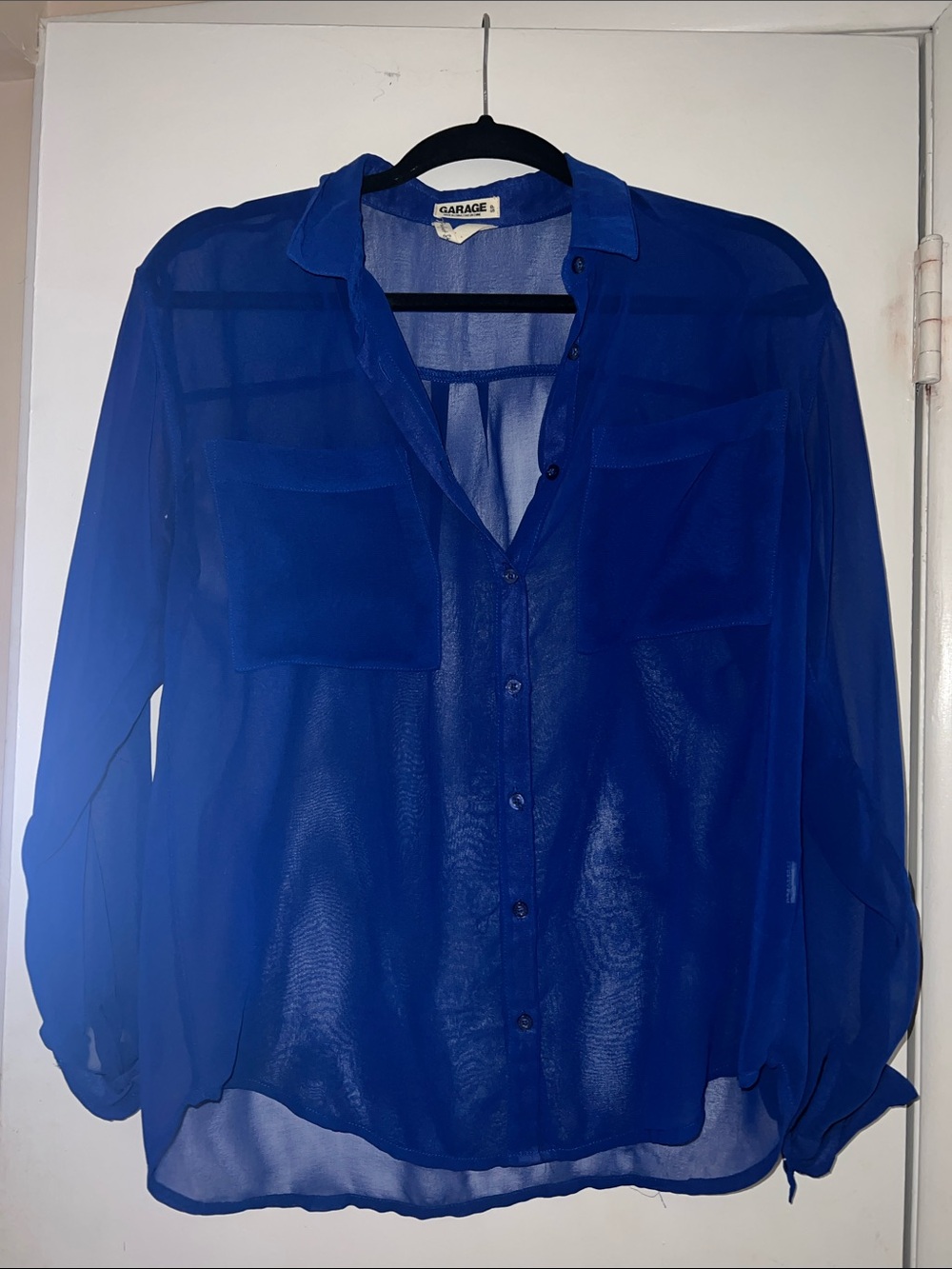 Sheer blue long sleeve button down top